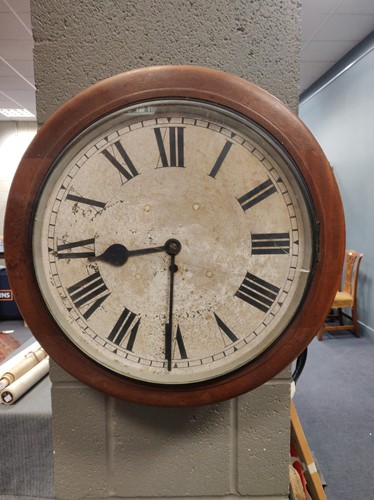 Lot 122 - A mid 20th century circular case wall clock...