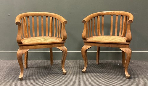 Lot 440 - A pair of 20th century tub armchairs, with...