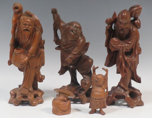 Lot 119 - Six carved wood Chinese figures to include a...