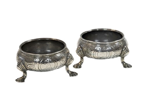 Lot 472 - A pair of George II silver cauldron salts