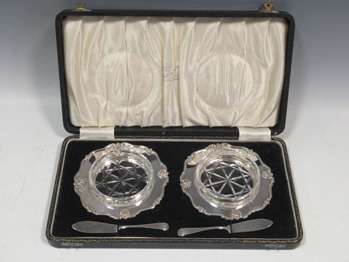 Lot 188 - A pair of silver butter dishes with knives and...