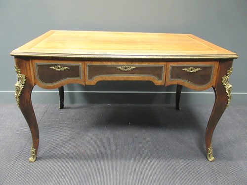 Lot 443 - A Louis XV style writing table with three...