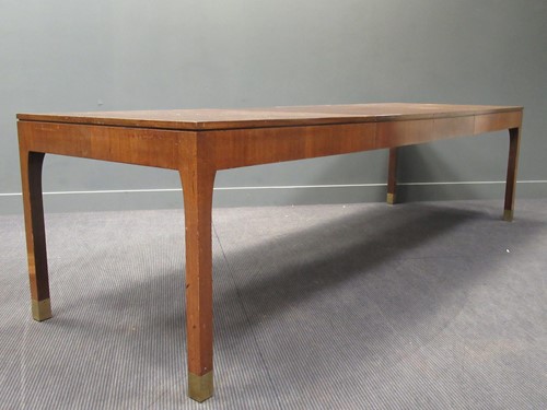 Lot 418 - A 20th century mahogany rectangular dining...