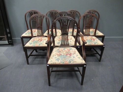 Lot 424 - A set of eight Hepplewhite style mahogany...