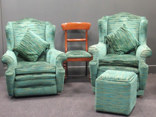 Lot 442 - Two upholstered wing armchairs with matching...