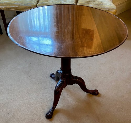 Lot 447 - A George III mahogany tilt top supper table...