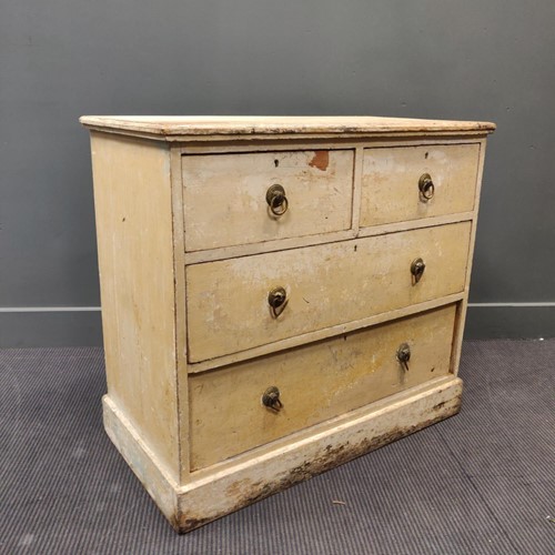 Lot 405 - A 19th century painted pine chest of drawers...
