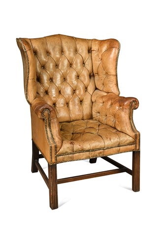 Lot 498 - A Georgian style leather wingback armchair, 20th century