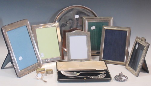 Lot 187 - Six silver photograph frames, a caddy spoon,...