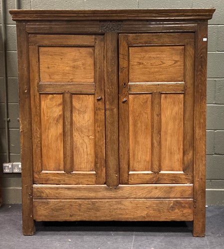 Lot 413 - A 17th/ 18th century elm and oak cupboard, the...