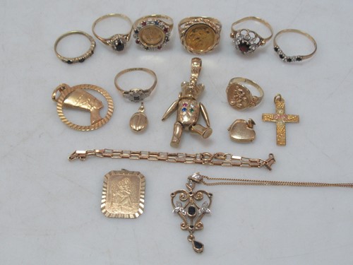 Lot 149 - A hallmarked 9ct gold teddy bear pendant, five...