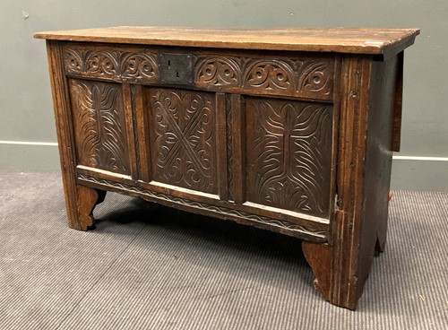 Lot 316 - A carved oak coffer, 17th century and later
