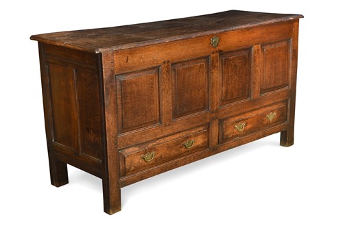Lot 341 - An early 18th century oak mule chest, the two...
