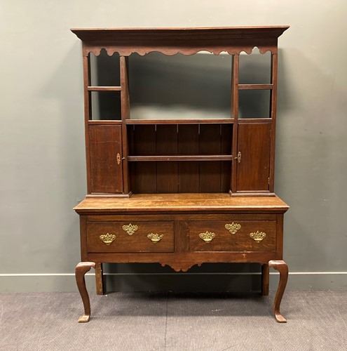 Lot 332 - A late 18th century oak dresser, the...