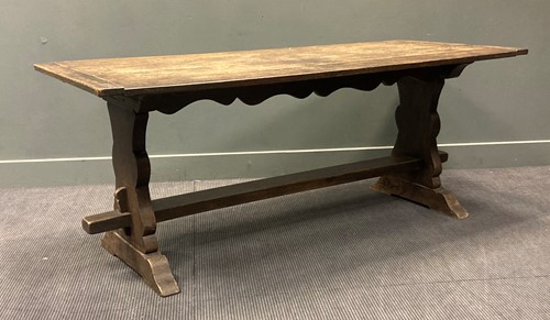 Lot 326 - A 17th century style oak trestle table, the...
