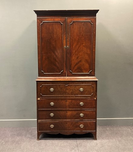 Lot 349 - An early 19th century mahogany secretaire...