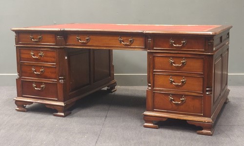 Lot 321 - A large Chippendale style mahogany partners...