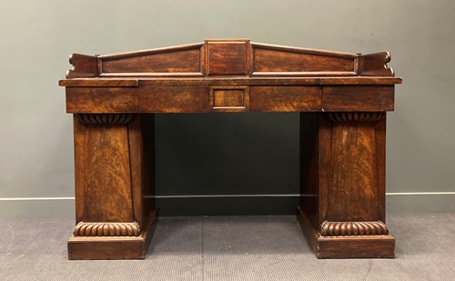 Lot 346 - A William IV mahogany sideboard, the shaped...