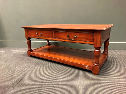 Lot 360 - A modern stained wood two-tier coffee table...