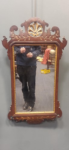 Lot 355 - A George III mahogany fret framed wall mirror,...