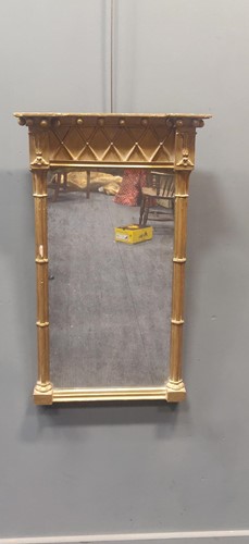 Lot 352 - A Regency gilt pier mirror, the rectangular...