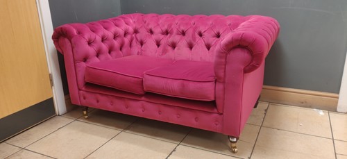 Lot 412 - A hot pink upholstered two-seater settee, 74 x...