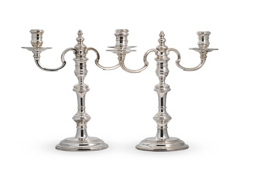 Lot 640 - A pair of Elizabeth II silver two light metamorphic candelabra