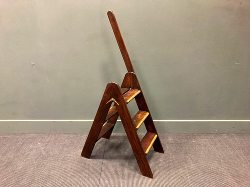 Lot 367 - A set of mahogany folding library steps with...
