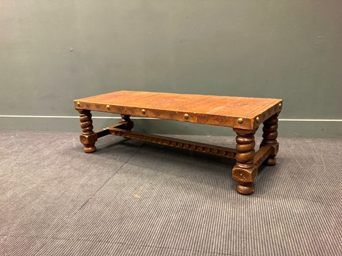 Lot 381 - Leather barely twist coffee table 40 x 131 x 51cm