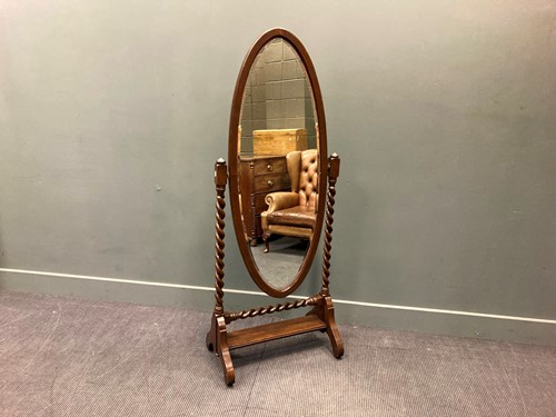 Lot 398 - An Edwardian oak barley twist cheval mirror,...