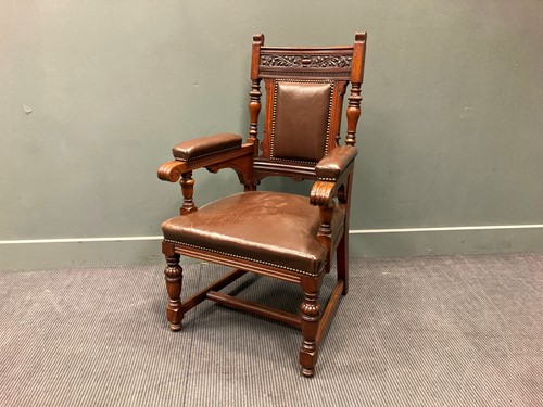 Lot 389 - A Victorian carved walnut and leather...