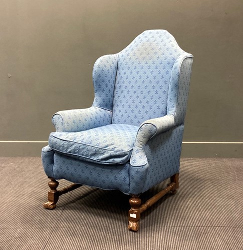 Lot 402 - A William & Mary style walnut wingback...
