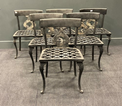 Lot 413 - A set of six cast metal dolphin back garden...