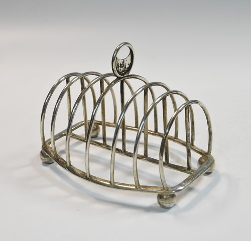 Lot 542A - A Victorian silver 7 bar toast rack, mark of John Samuel Hunt