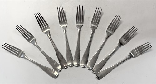 Lot 466 - Newcastle - A set of nine George III silver table forks