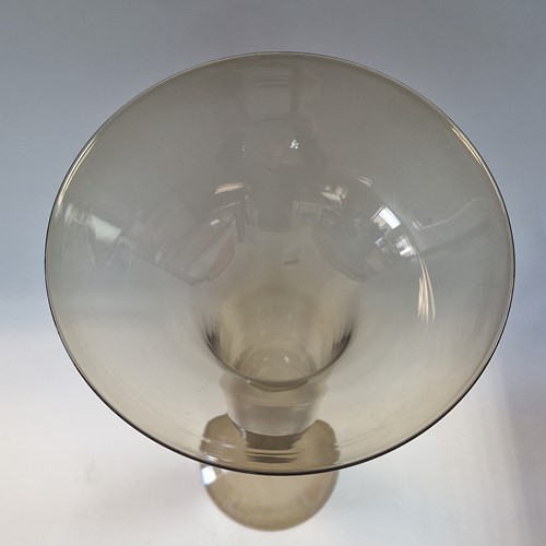 Lot 23 - Simon Moore (born 1959), a tall green glass vase, 2014
