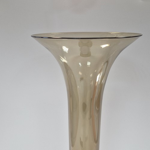 Lot 23 - Simon Moore (born 1959), a tall green glass vase, 2014