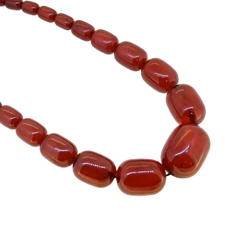 Lot 41 - A cherry bakelite bead necklace