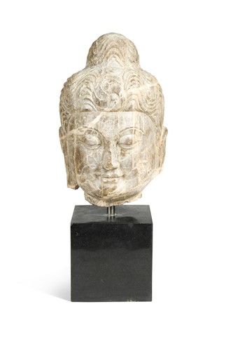 Lot 30 - A marble head of Avalokitesvara, Sui Dynasty style