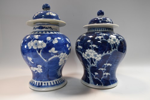 Lot 47 - A group of five Chinese blue and white porcelain vases, Qing Dynasty, 19th century