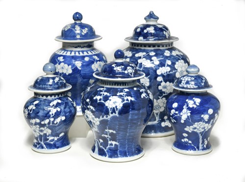 Lot 28 - A group of five Chinese blue and white porcelain vases, Qing Dynasty, 19th century