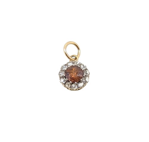 Lot 46 - A zircon and diamond pendant