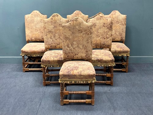 Lot 658 - Six Flemish style upholstered oak dining...