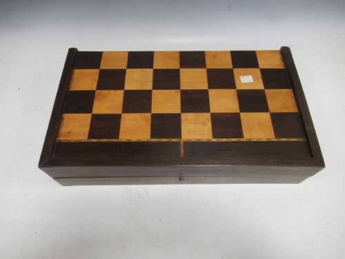 Lot 63 - A folding inlaid wood draughts and backgammon...