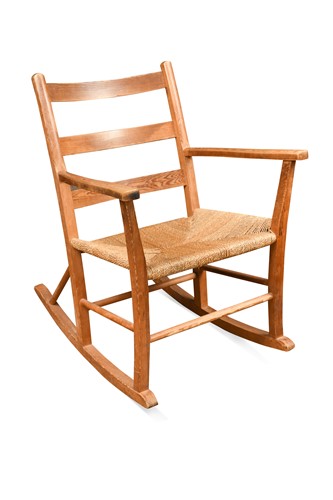 Lot 223 - A Norwegian pine ladder back rocking chair, circa 1930s