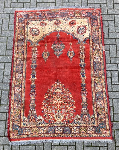 Lot 379 - A Two column prayer rug with red ground 201 x...