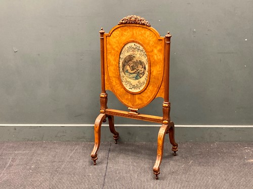 Lot 407 - A satinwood adjustable firescreen with silk...