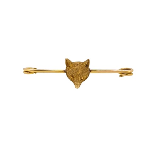 Lot 39 - A fox head stock pin brooch