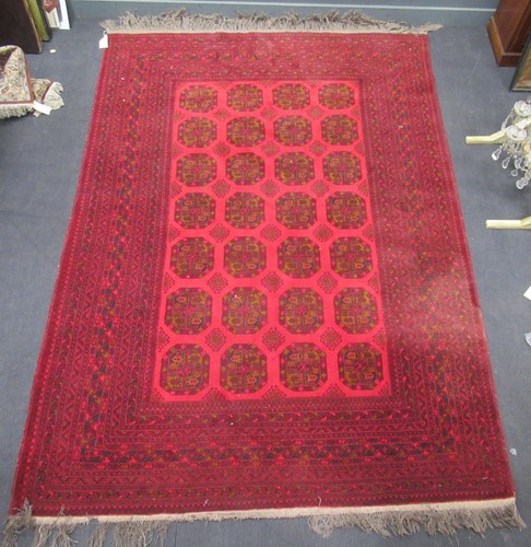 Lot 496 - A large Afghan carpet, 380 x 250cm