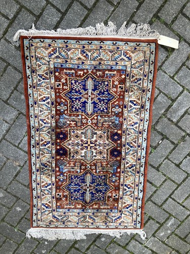 Lot 495 - A small Caucasian rug, 140 x 80cm